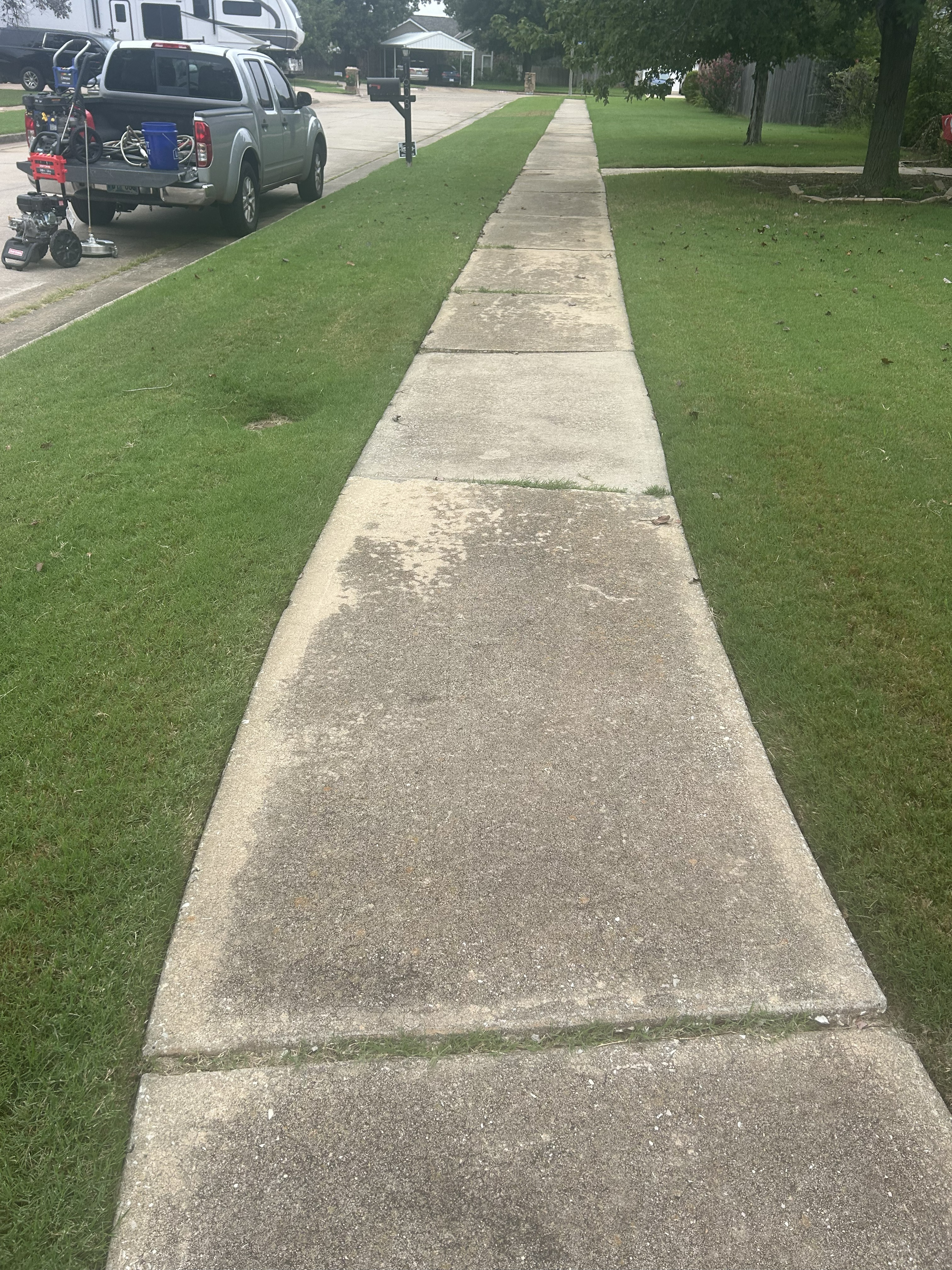 Sidewalk before pressure washing